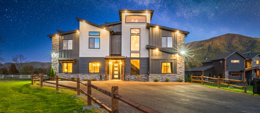 Luxury STR listing with digitally enhanced evening sky