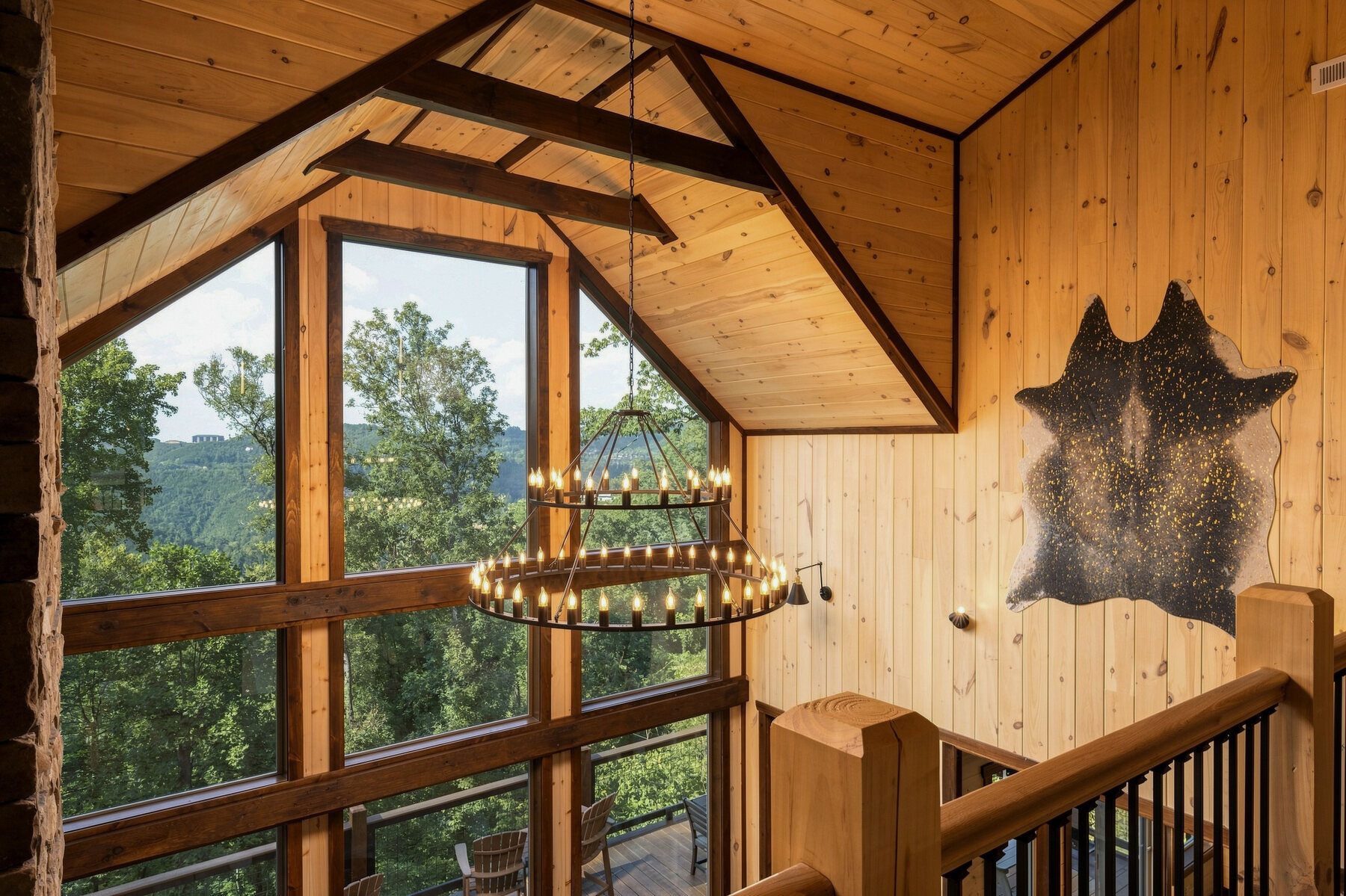 Upper-level view of the chandelier and window structure