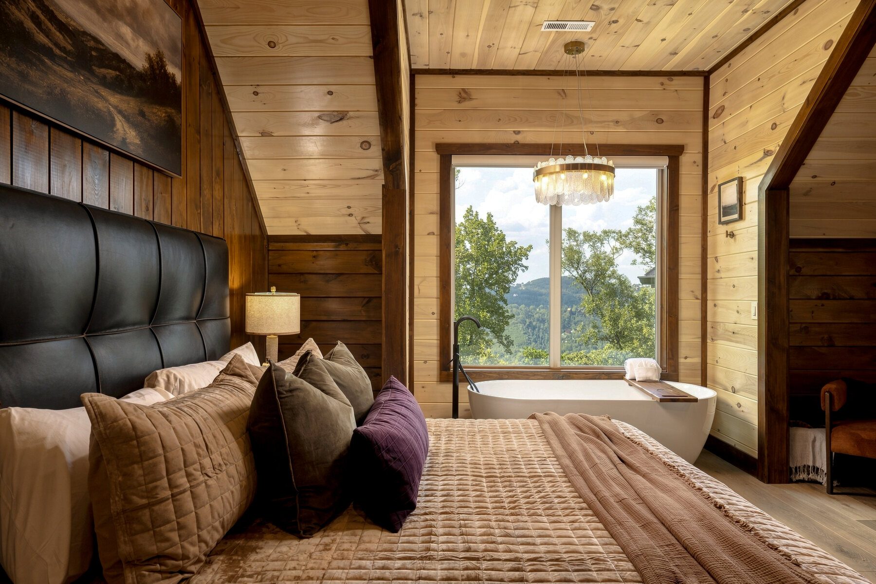 Primary bedroom with a framed mountain view