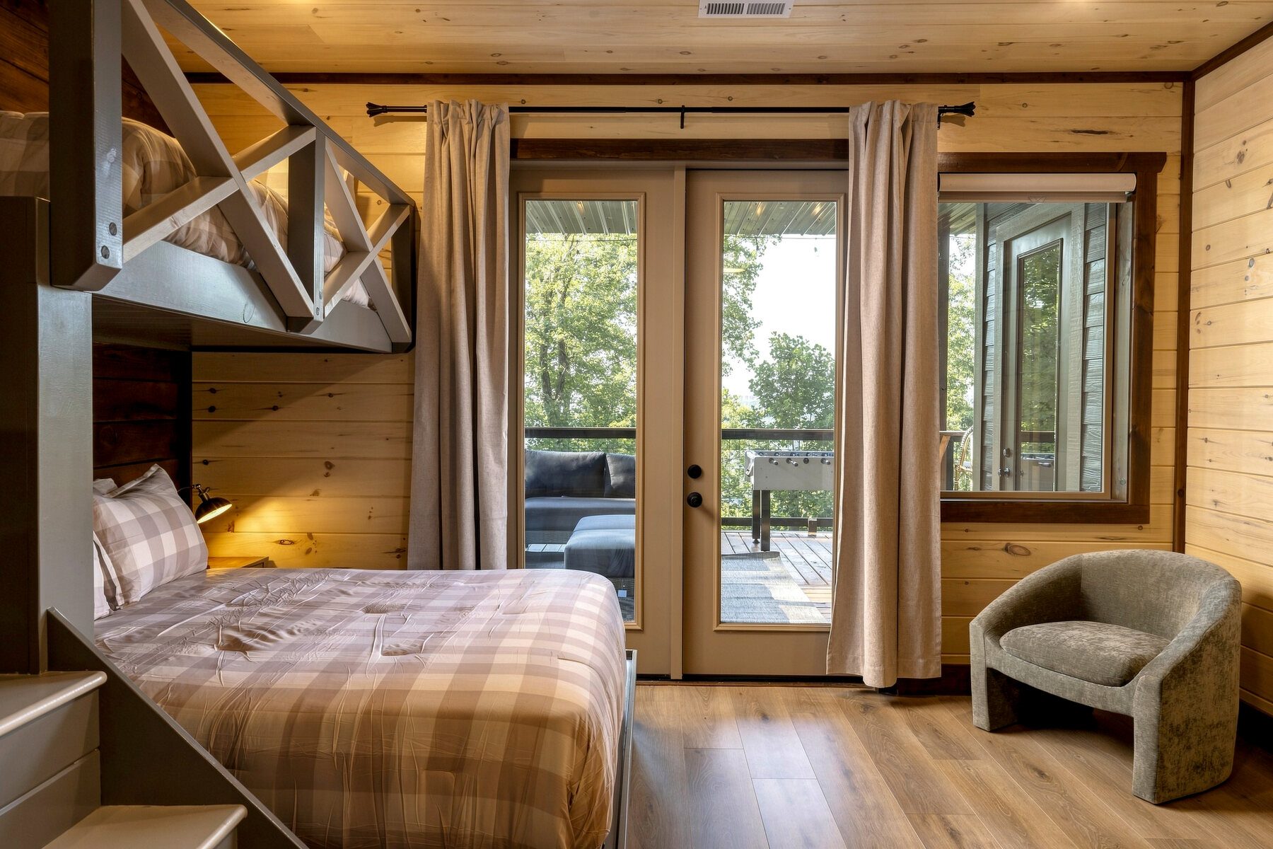 Bunk room with direct access to the outdoor deck
