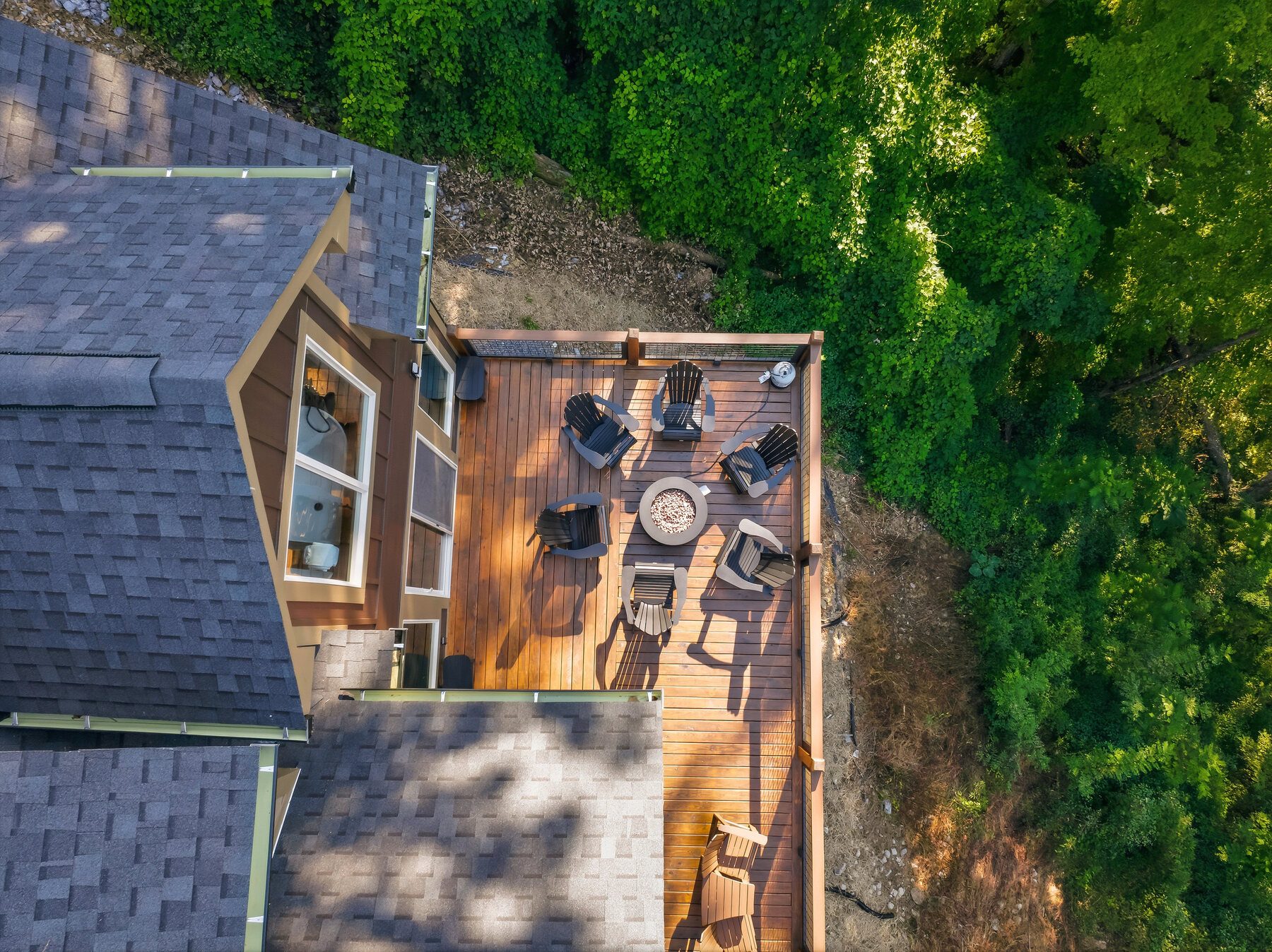 Overhead aerial view of the cabin and its outdoor decks