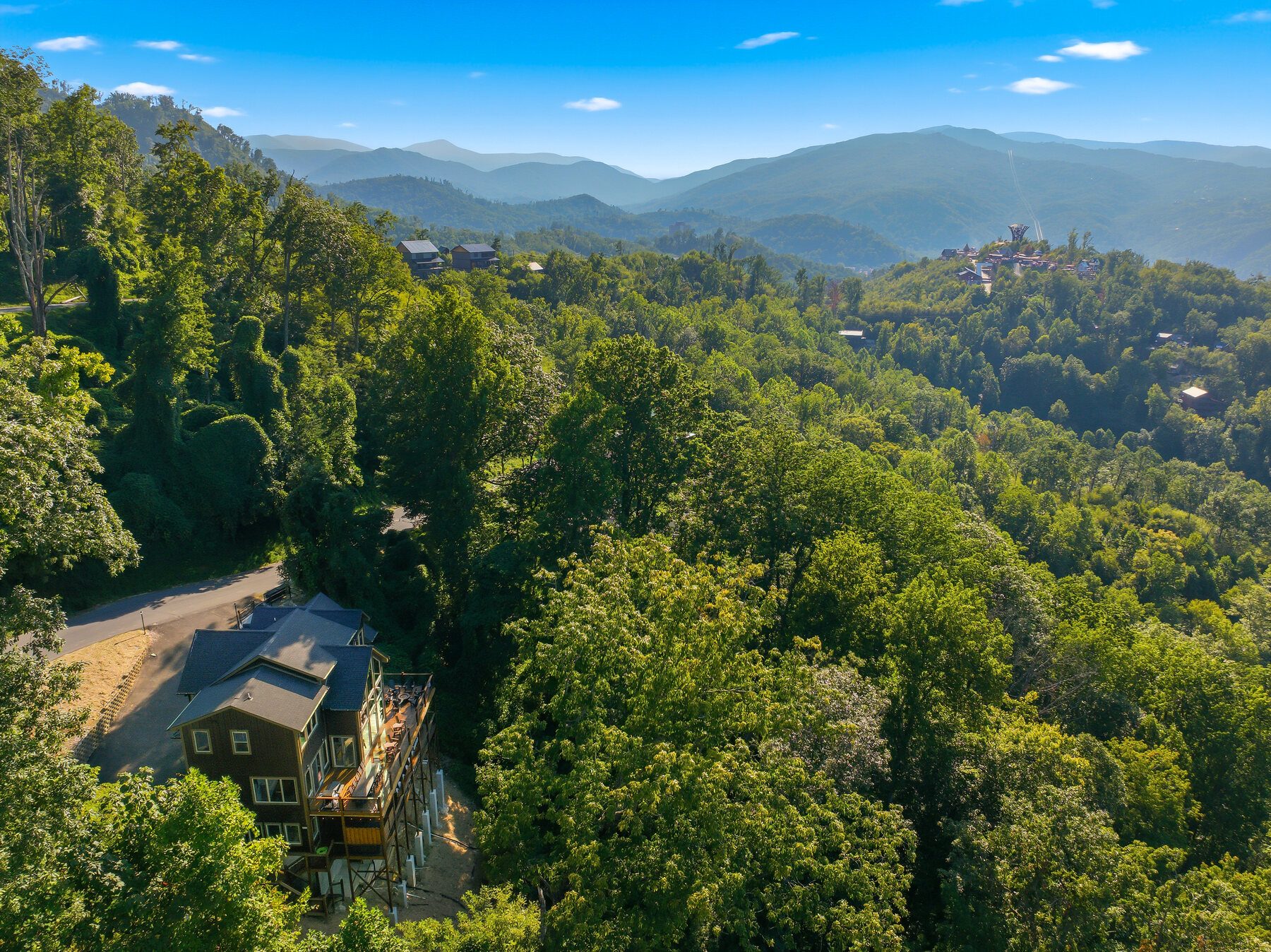 Aerial view placing The Forrest House within the Smoky Mountain landscape