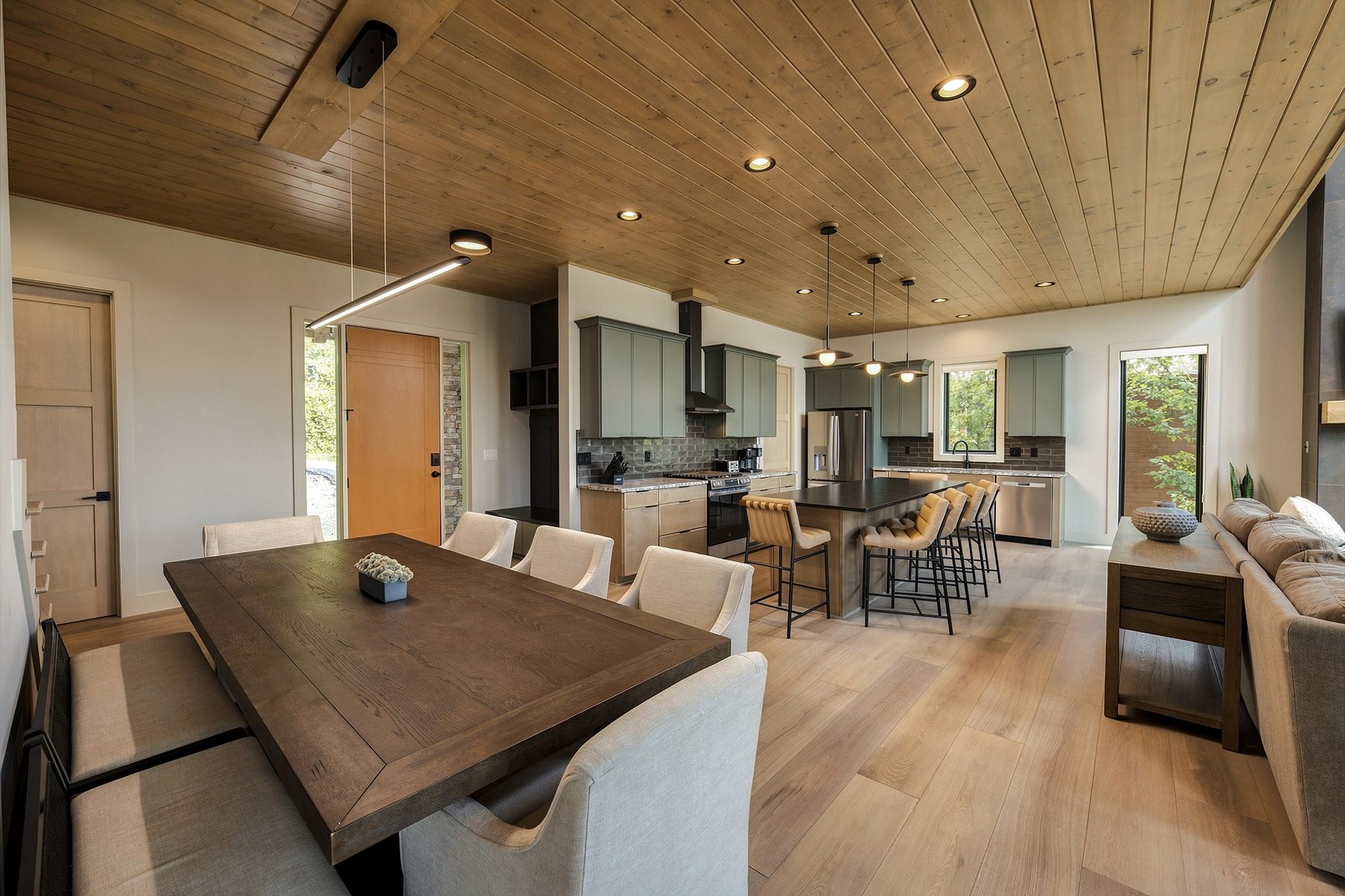 Dining table visually connected to the open kitchen