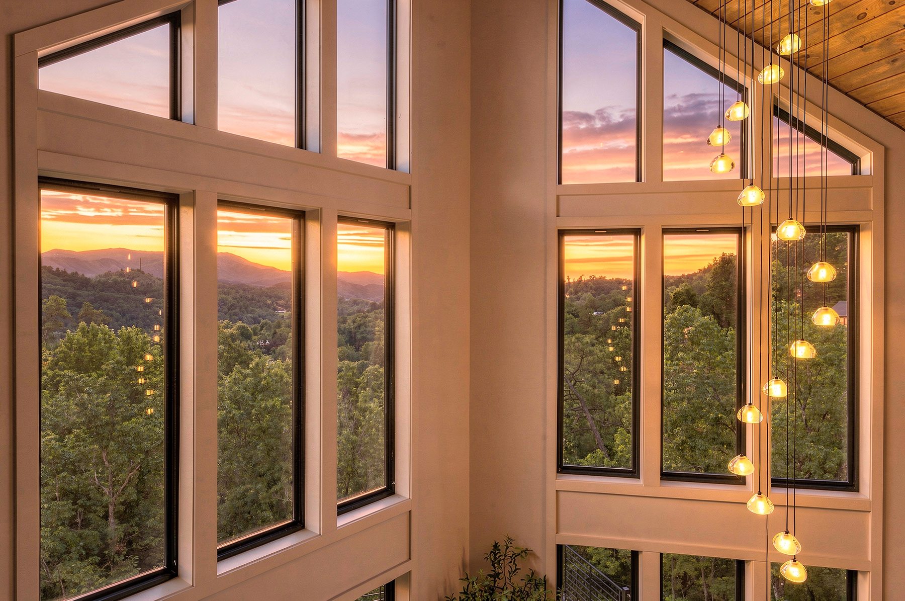 Sunset reflected through the full-height gable windows