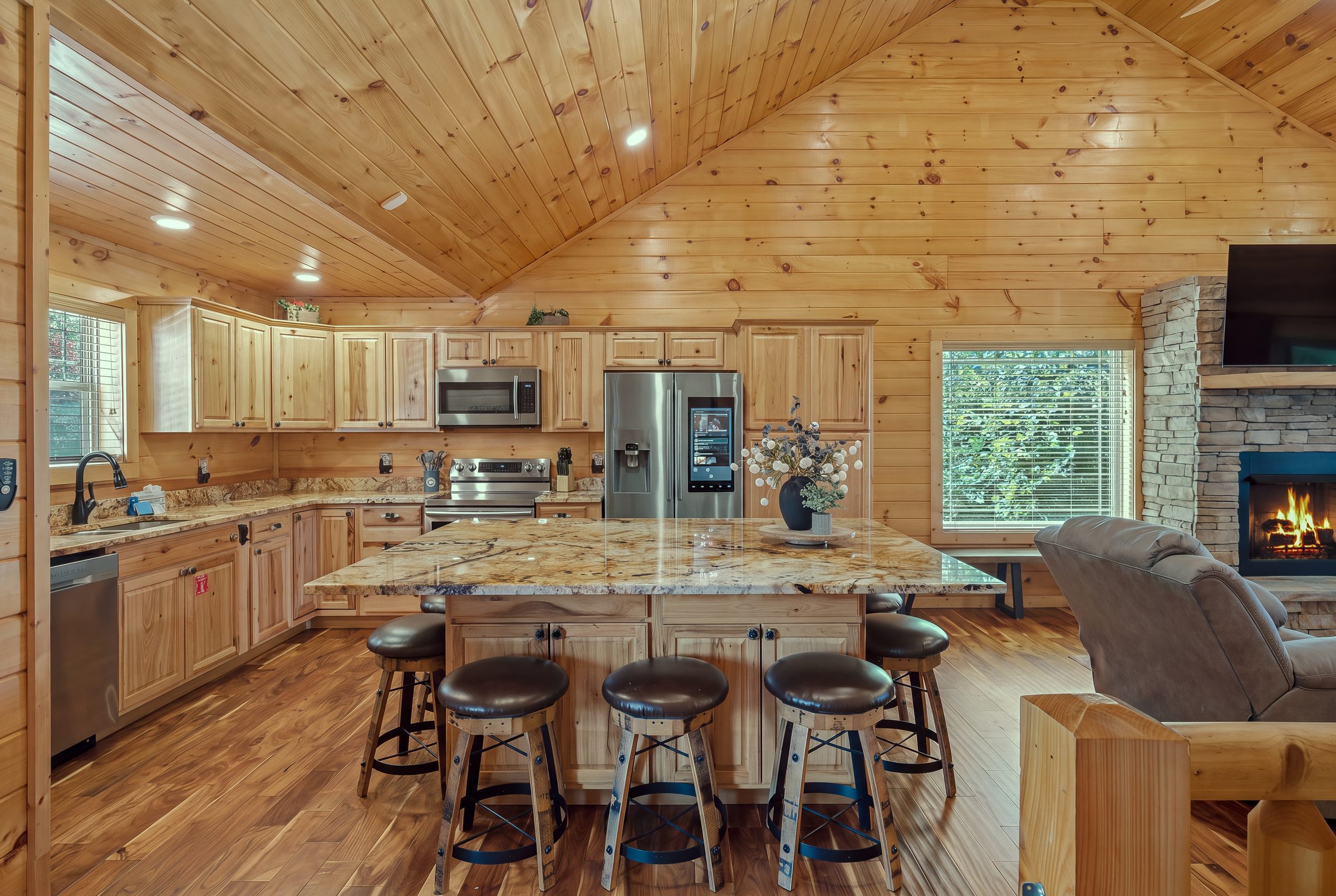 Open kitchen in warm pine