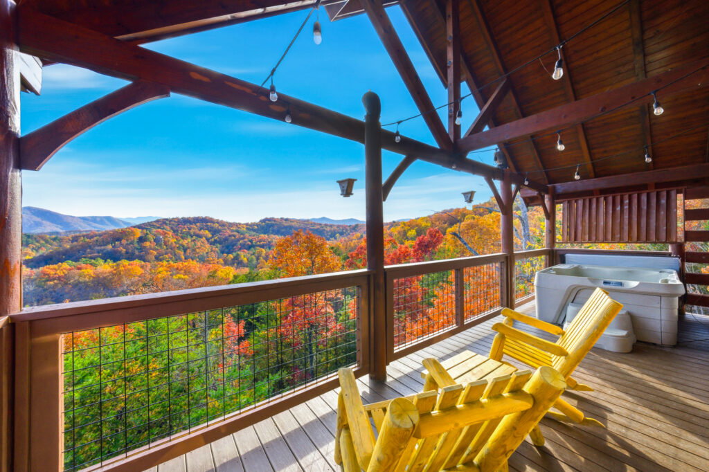 Back deck jacuzzi shot with incredible mountain views of the smokies during peak fall season