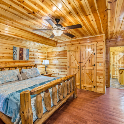 Rustic Log Cabin Bedroom &ndash; Sevierville Tennessee Real Estate Photography