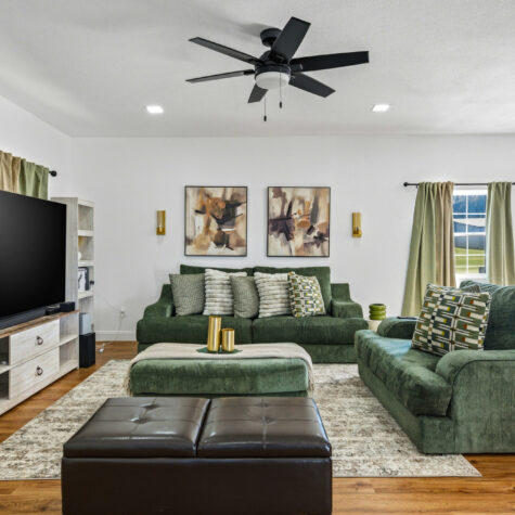 Modern Living Room with Green Sofa &ndash; Athens Tennessee Real Estate Photography