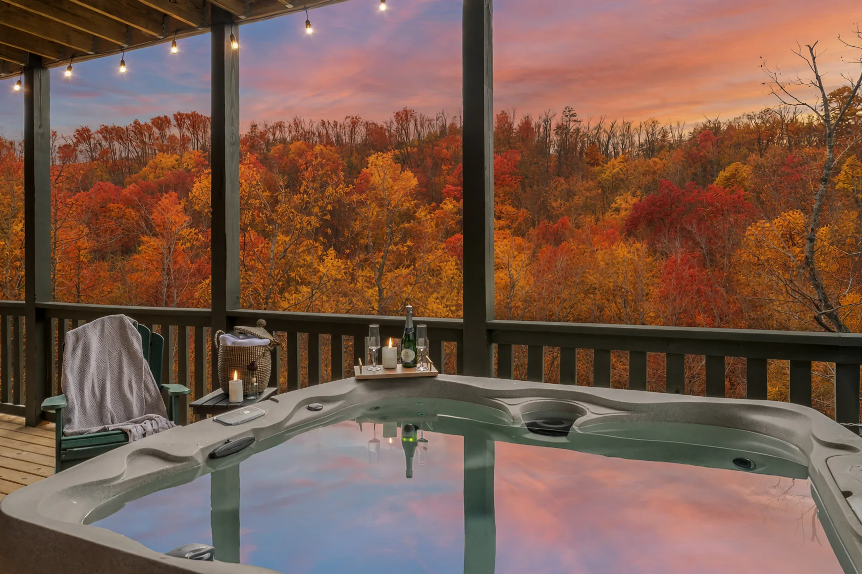 Staged dusk deck and hot tub with fall color in Dandridge